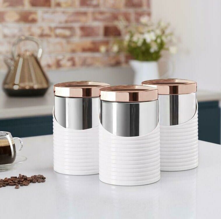 White and copper tea and store coffee canisters